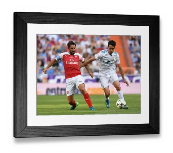 Framed Print : Arsenal vs. Real Madrid: A Legendary Clash at Bernabeu (2018-19)