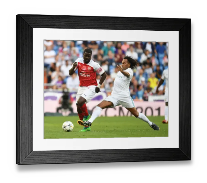 Framed Print : Arsenal vs. Real Madrid: A Legendary Clash at Bernabeu (2018-19) Framed Print : Arsenal vs. Real Madrid: A Legendary Clash at Bernabeu (2018-19)