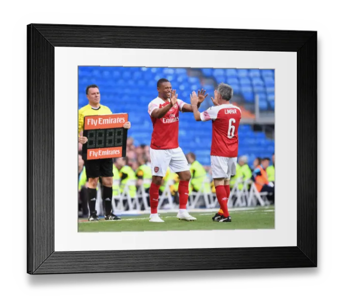 Framed Print : Arsenal vs. Real Madrid Legends: A Classic Football Showdown at Bernabeu (2018-19)