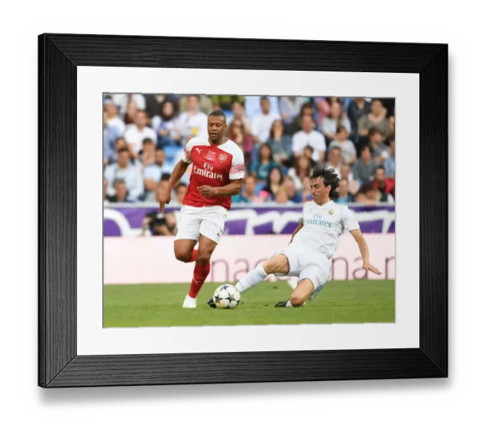 Framed Print : Arsenal vs Real Madrid: A Legendary Clash (2018-19) Framed Print : Arsenal vs Real Madrid: A Legendary Clash (2018-19)