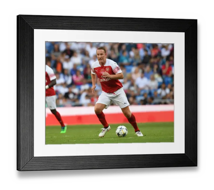 Framed Print : Arsenal vs Real Madrid: A Legendary Clash at Bernabeu, 2018 Framed Print : Arsenal vs Real Madrid: A Legendary Clash at Bernabeu, 2018