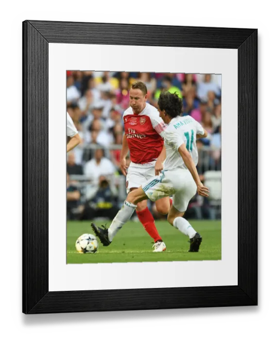 Framed Print : Arsenal vs. Real Madrid: A Legendary Clash at Bernabeu (2018-19)