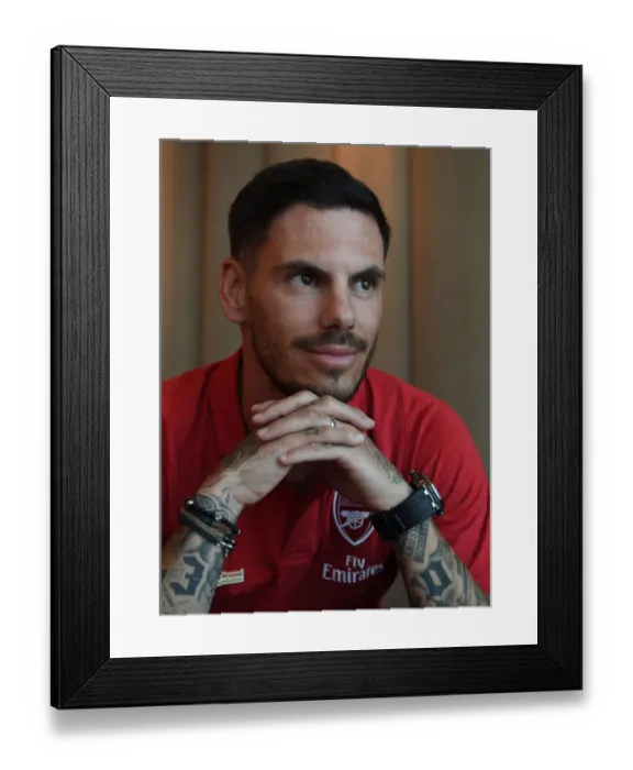 Framed Print : Arsenal Legends vs. Real Madrid Legends: A Clash of Football Greats at Bernabeu Stadium (2018-19) - Jeremie Aliadiere Prepares for Battle
