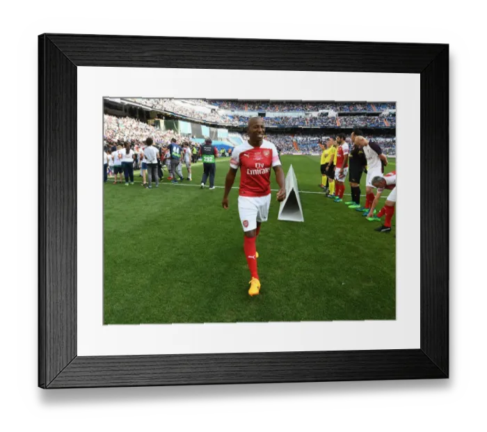 Framed Print : A Clash of Football Legends: Arsenal vs Real Madrid at Bernabeu, 2018