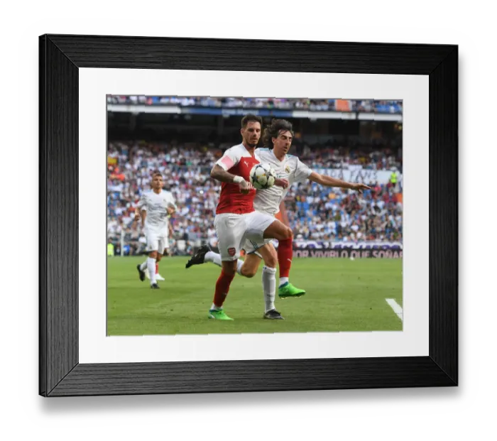 Framed Print : Arsenal vs. Real Madrid: A Legendary Clash at Bernabeu (2018-19) Framed Print : Arsenal vs. Real Madrid: A Legendary Clash at Bernabeu (2018-19)