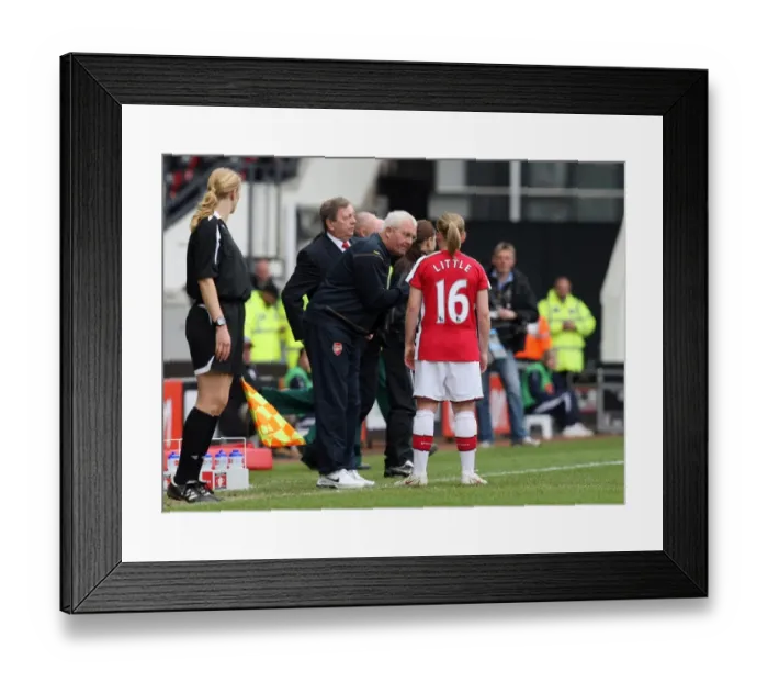 Framed Print : Tony Gervaise the Arsenal Assistant Manager talks to Kim Little