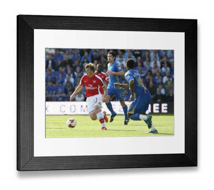 Framed Print : Arshavin's Double Strike: Arsenal's 4-0 Victory Over Pompey (2009) Framed Print : Arshavin's Double Strike: Arsenal's 4-0 Victory Over Pompey (2009)