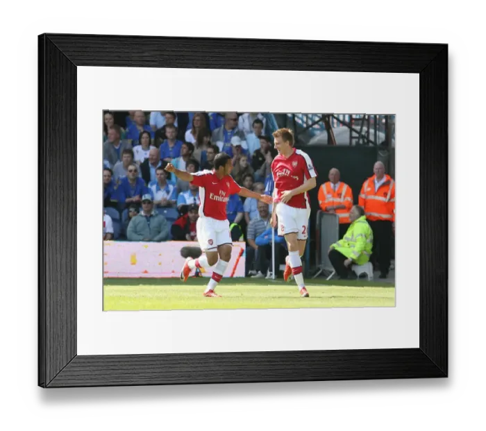 Framed Print : Bendtner and Walcott: Celebrating Arsenal's First Goal in a 4-0 Victory over Portsmouth