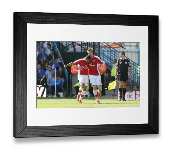 Framed Print : Arsenal's Unforgettable Victory: Bendtner and Walcott's Double Act - 4 Goals Against Portsmouth (2009)