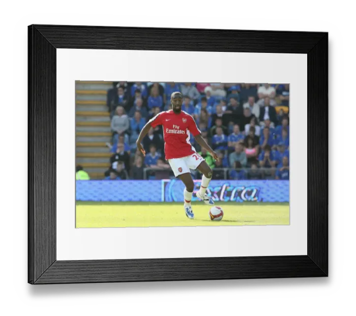 Framed Print : Johan Djourou's Dominance: Arsenal Crushes Portsmouth 4-0 in the Barclays Premier League