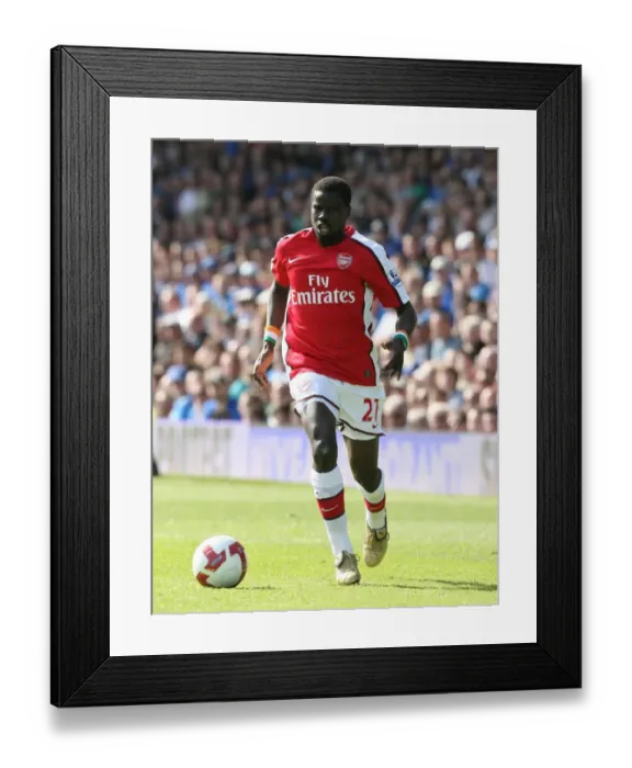 Framed Print : Dominant Eboue: Arsenal's 4-0 Crush of Portsmouth in the Premier League
