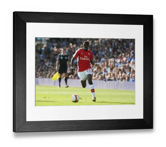 Framed Print : Arsenal's Eboue Shines: 4-0 Thrashing of Portsmouth in Premier League Framed Print : Arsenal's Eboue Shines: 4-0 Thrashing of Portsmouth in Premier League