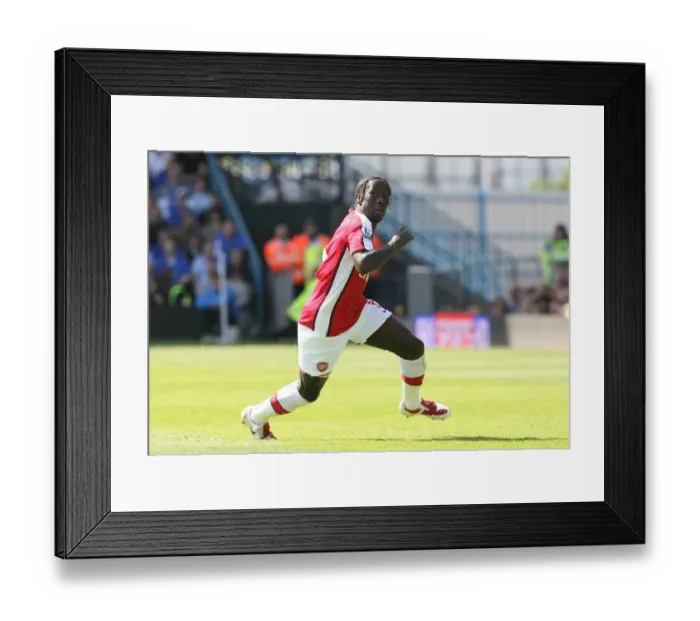 Framed Print : Unstoppable Sagna: Arsenal's 4-0 Rout of Portsmouth