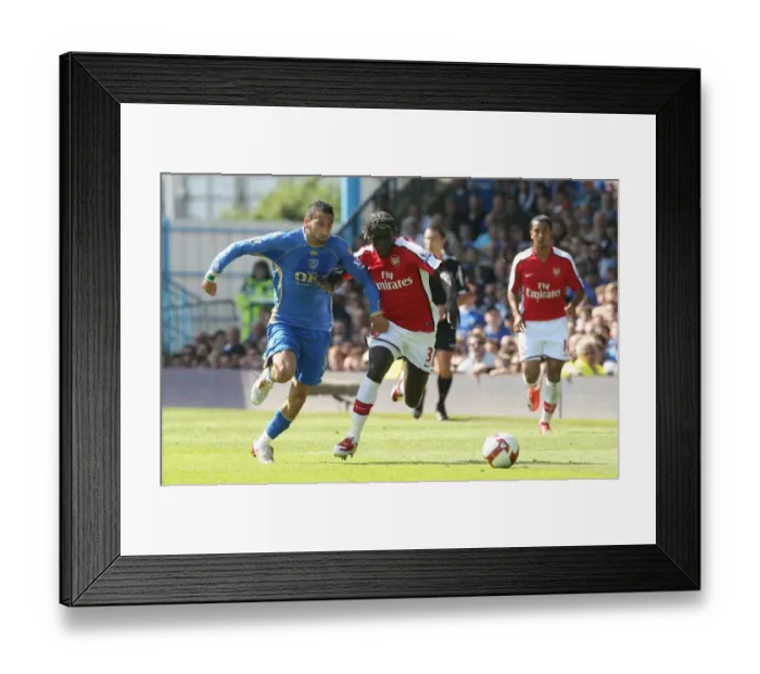 Framed Print : Sagna's Double Domination: Arsenal's 4-0 Triumph Over Portsmouth, 2009