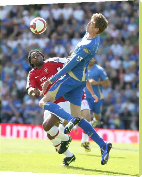 Alex Song (Arsenal) Peter Crouch (Portsmouth)