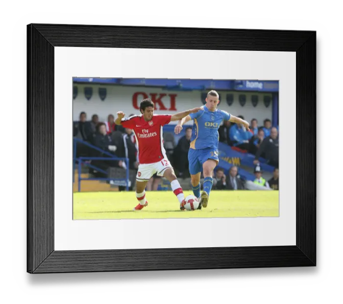 Framed Print : Carlos Vela (Arsenal) Sean Davis (Portsmouth)
