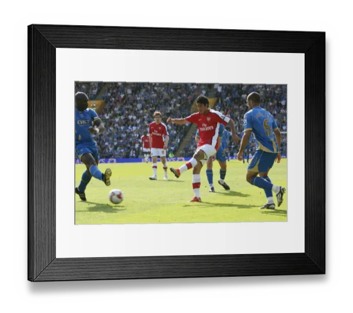 Framed Print : Carlos Vela shoots past Portsmouth goalkeeper David Framed Print : Carlos Vela shoots past Portsmouth goalkeeper David