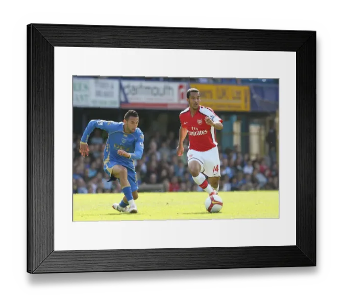 Framed Print : Theo Walcott (Arsenal) Nadir Belhadj (Portsmouth)