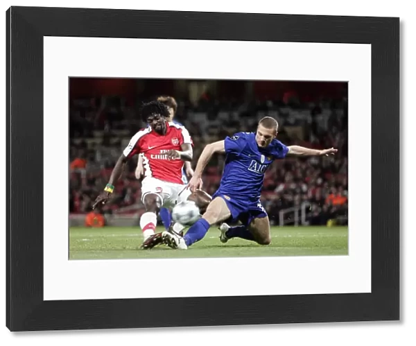Emmanuel Adebayor (Arsenal) Nemanja Vidic (Man Utd)