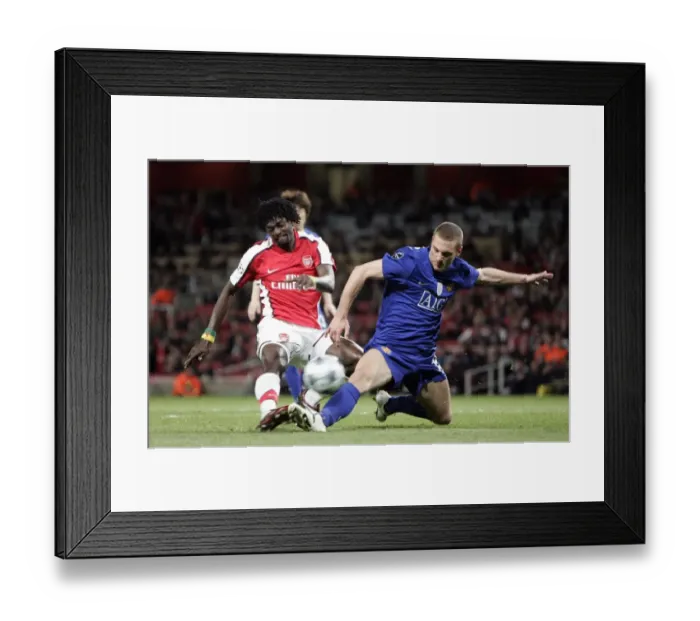 Framed Print : Emmanuel Adebayor (Arsenal) Nemanja Vidic (Man Utd)