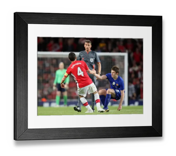 Framed Print : Heartbreak at the Emirates: Cesc Fabregas vs Michael Carrick in Arsenal's 3-1 Semi-Final Defeat to Manchester United in the UEFA Champions League Framed Print : Heartbreak at the Emirates: Cesc Fabregas vs Michael Carrick in Arsenal's 3-1 Semi-Final Defeat to Manchester United in the UEFA Champions League