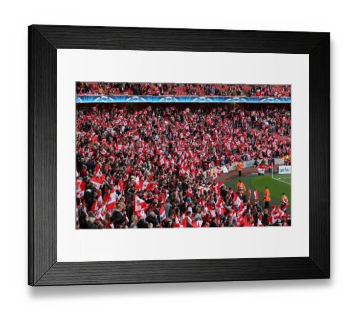 Framed Print : Arsenal fans wave their flags before the match Framed Print : Arsenal fans wave their flags before the match