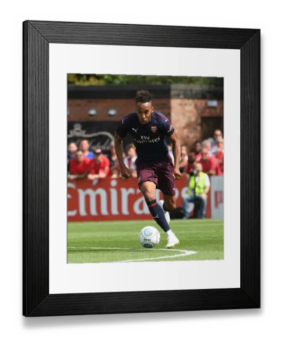 Framed Print : Arsenal's Aubameyang in Action: Pre-Season Clash against Borehamwood (2018)