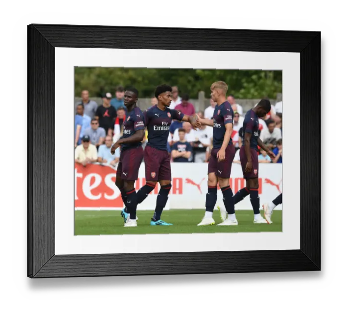 Framed Print : Reiss Nelson, Jordi Osei-Tutu, and Emile Smith Rowe: Celebrating Goals in Arsenal's Pre-Season Victory over Borehamwood