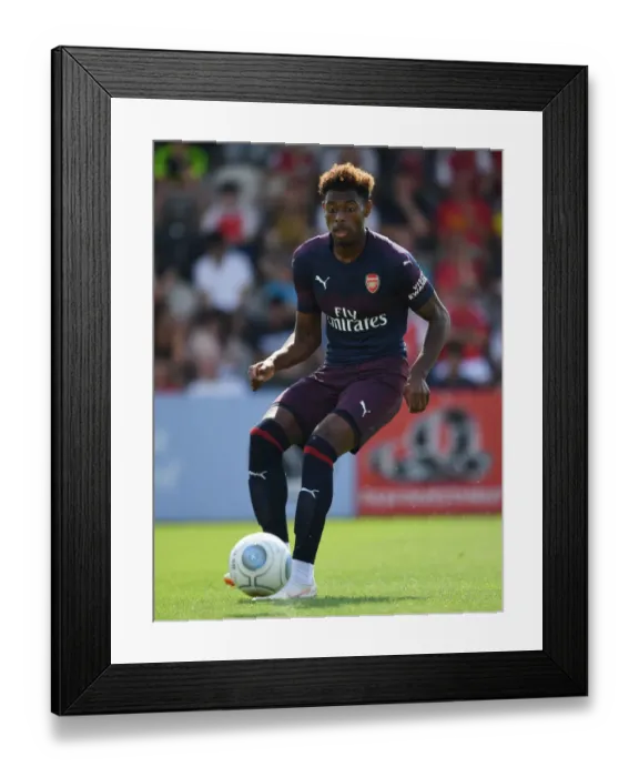 Framed Print : Jeff Reine-Adelaide in Action: Arsenal's Pre-Season Clash against Borehamwood (2018)