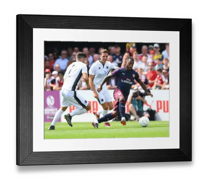 Framed Print : Alex Lacazette in Action: Arsenal's 2018 Pre-Season Clash with Borehamwood Framed Print : Alex Lacazette in Action: Arsenal's 2018 Pre-Season Clash with Borehamwood