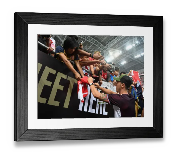 Framed Print : Mesut Ozil Greets Adoring Arsenal Fans After Arsenal v Atletico Madrid Match, 2018-19