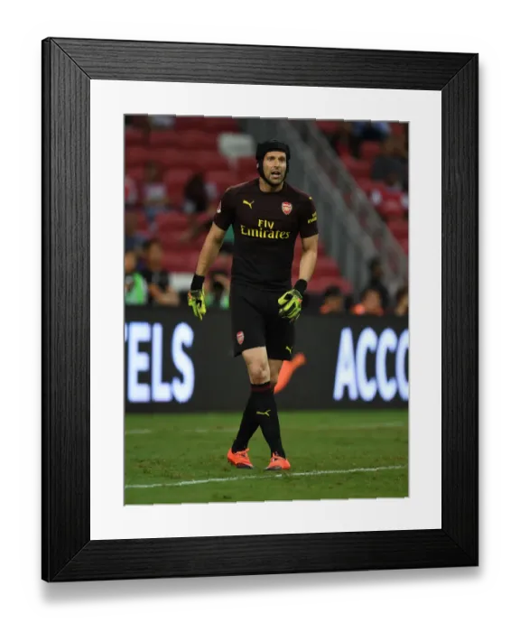 Framed Print : Arsenal's Focused Cech: Guarding the Goal Against Atletico Madrid in the International Champions Cup (2018, Singapore)