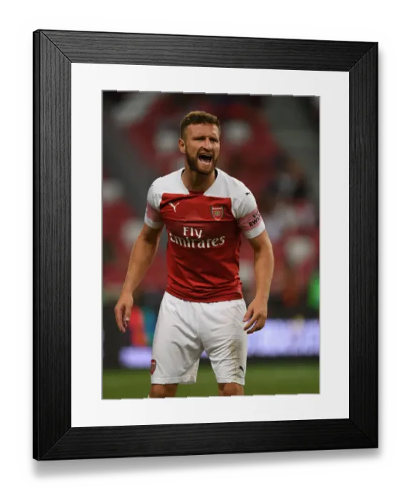 Framed Print : Shkodran Mustafi Faces Off Against Atletico Madrid in Arsenal's 2018 International Champions Cup Match