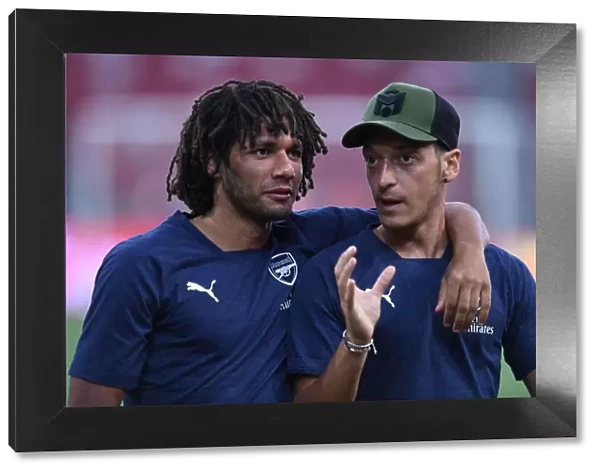 Arsenal's Elneny and Ozil Prepare for Action Against Atletico Madrid (2018-19)