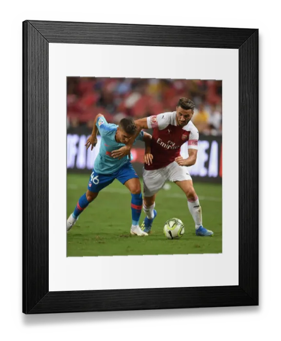 Framed Print : Clash of the Wings: Sead Kolasinac vs. Oscar Pinchi - Arsenal vs. Atletico Madrid ICC Showdown (2018, Singapore)
