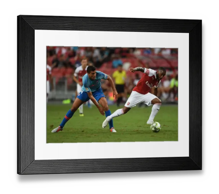 Framed Print : Clash of the Titans: Lacazette vs. Rodriguez - Arsenal vs. Atletico Madrid ICC 2018