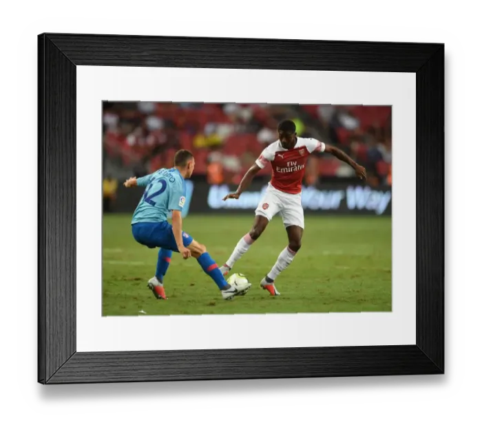 Framed Print : Arsenal's Ainsley Maitland-Niles Faces Off Against Atletico Madrid's Mikel Carro in International Champions Cup 2018 Framed Print : Arsenal's Ainsley Maitland-Niles Faces Off Against Atletico Madrid's Mikel Carro in International Champions Cup 2018