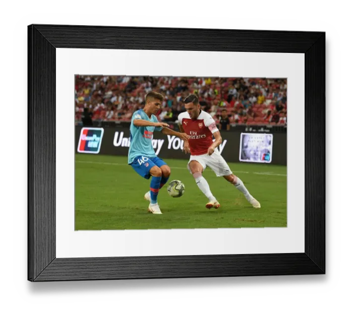 Framed Print : Clash of Titans: Lucas Perez vs. Oscar Pinchi - Arsenal vs. Atletico Madrid, International Champions Cup 2018
