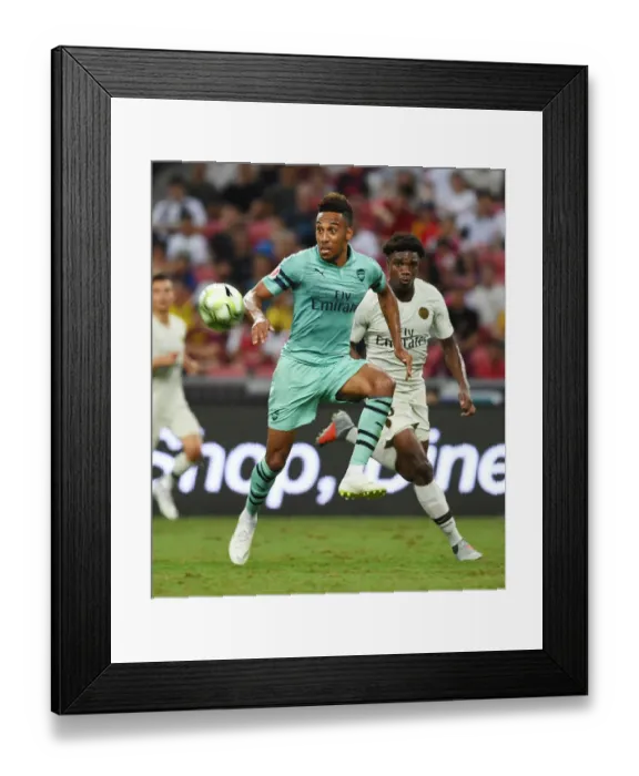 Framed Print : Arsenal's Aubameyang Outmaneuvers PSG's Mbe Soh in International Champions Cup Clash Framed Print : Arsenal's Aubameyang Outmaneuvers PSG's Mbe Soh in International Champions Cup Clash
