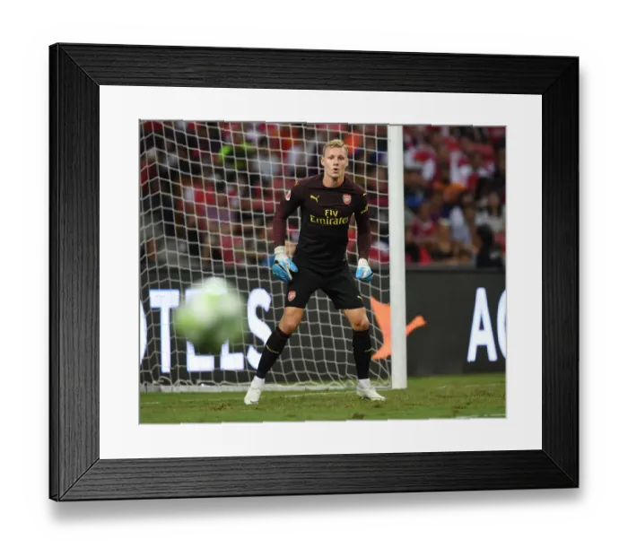 Framed Print : Bernd Leno in Action: Arsenal vs. Paris Saint-Germain at 2018 International Champions Cup, Singapore Framed Print : Bernd Leno in Action: Arsenal vs. Paris Saint-Germain at 2018 International Champions Cup, Singapore