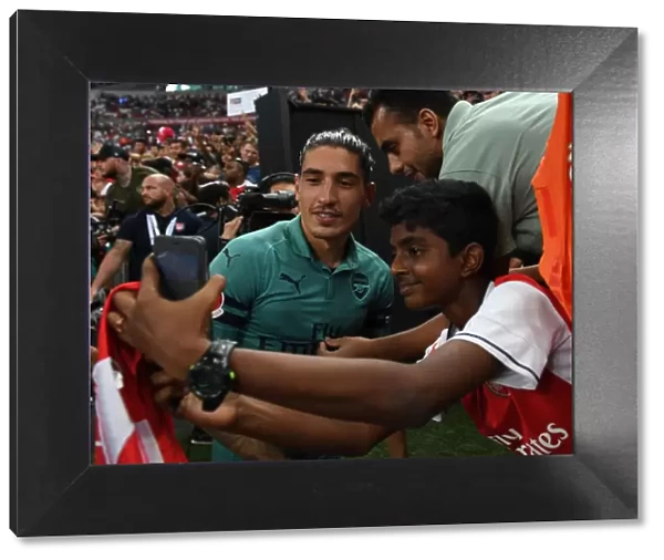 Arsenal's Hector Bellerin and Fan Share Unforgettable Selfie after Arsenal vs. Paris Saint-Germain Match, Singapore 2018