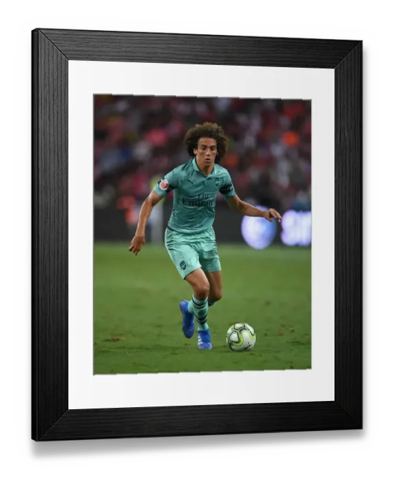 Framed Print : Arsenal's Guendouzi Takes on Paris Saint-Germain: A Clash of Rising Stars in International Champions Cup (2018, Singapore)