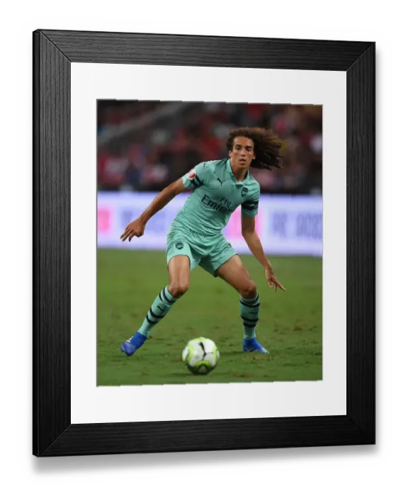 Framed Print : Arsenal's Guendouzi Goes Head-to-Head with Paris Saint-Germain in International Champions Cup Clash
