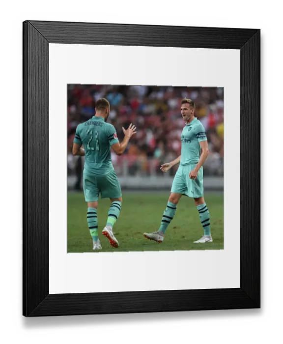 Framed Print : Arsenal's Holding and Chambers Celebrate Goal Against Paris Saint-Germain in 2018 International Champions Cup, Singapore