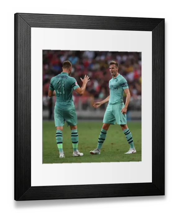 Framed Print : Arsenal's Holding and Chambers Celebrate Goal Against Paris Saint-Germain in 2018 International Champions Cup, Singapore