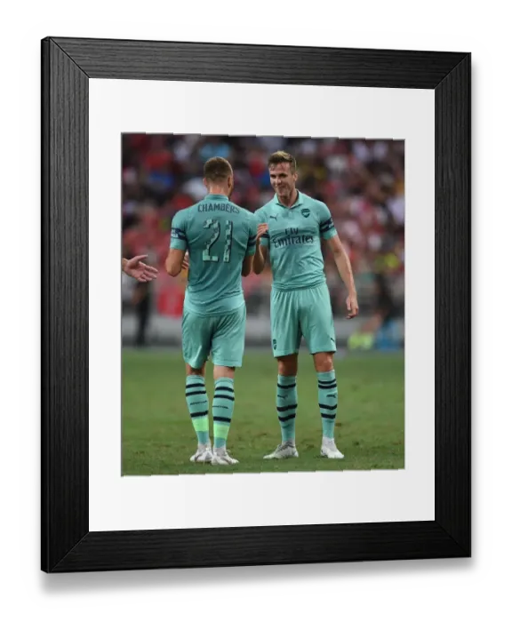 Framed Print : Arsenal's Holding and Chambers Celebrate Goal Against Paris Saint-Germain in 2018 International Champions Cup, Singapore