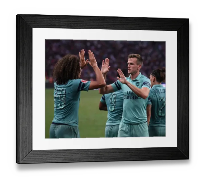 Framed Print : Arsenal's Unstoppable Moment: Holding and Guendouzi Celebrate Goal Against Paris Saint-Germain Framed Print : Arsenal's Unstoppable Moment: Holding and Guendouzi Celebrate Goal Against Paris Saint-Germain