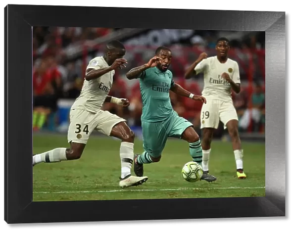Clash of Stars: Lacazette vs. Nsoki in Arsenal's Battle Against PSG