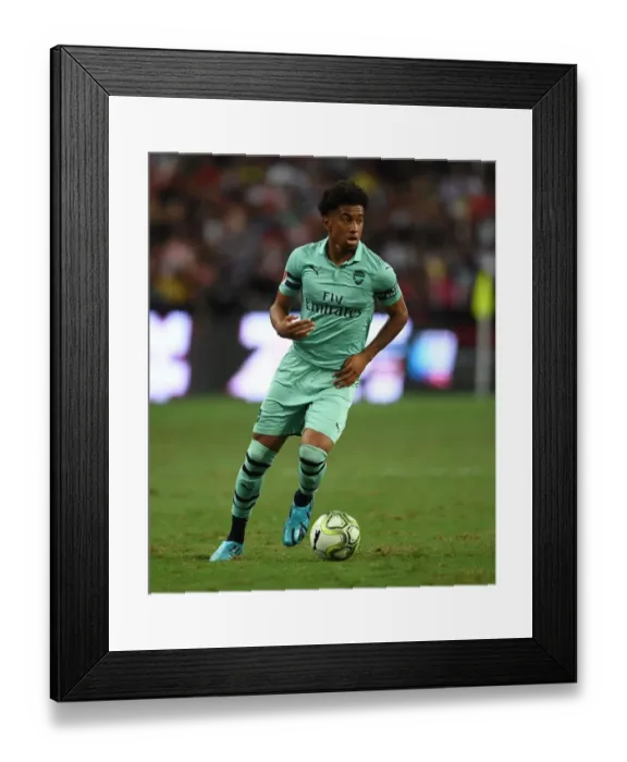 Framed Print : Reiss Nelson Stars: Arsenal's Breakout Performance Against Paris Saint-Germain in 2018 ICC, Singapore