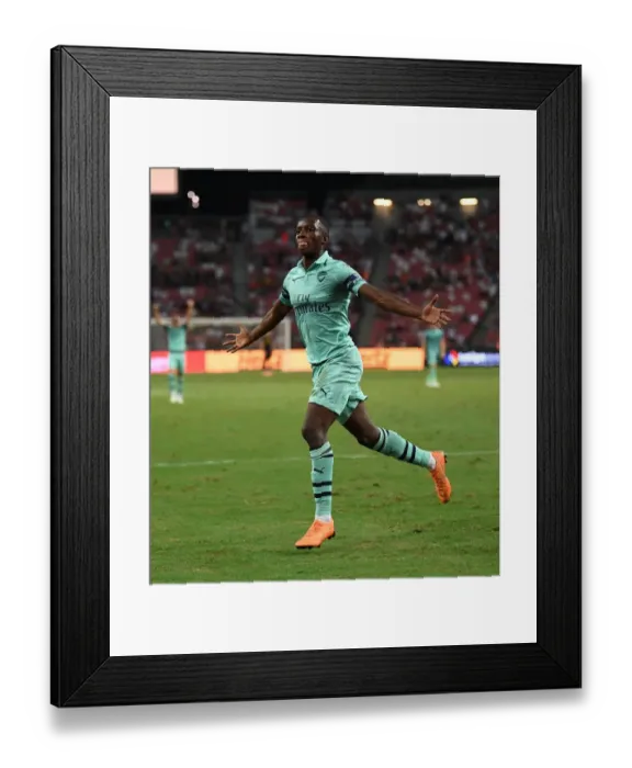 Framed Print : Eddie Nketiah's Stunner: Arsenal Stuns Paris Saint-Germain in 2018 International Champions Cup, Singapore